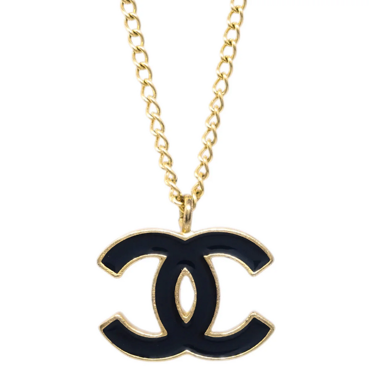 REGAL™ CHANEL BLACK AND GOLD PENDANT.