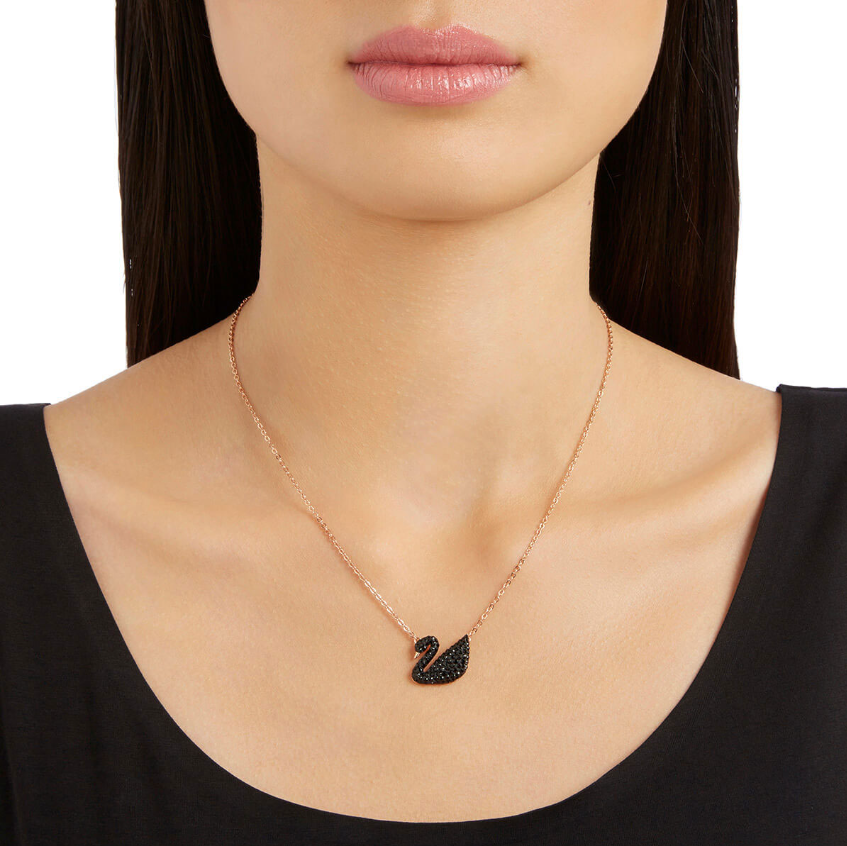 REGAL™ GOLD TONED BLACK SWAN PENDANT.