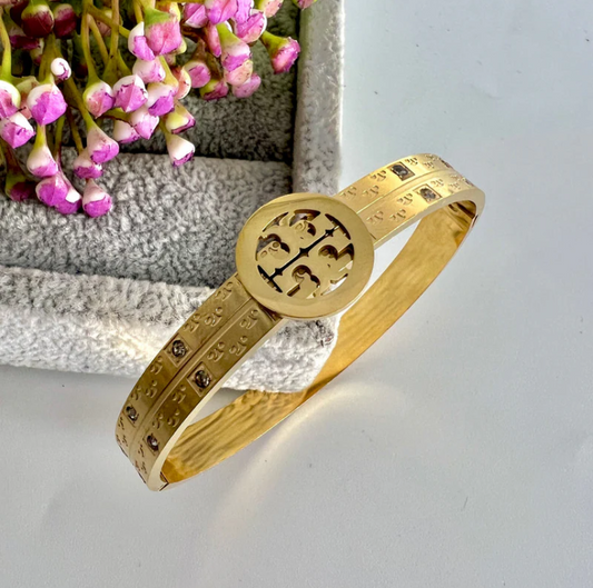 REGAL™ TORY BURCH GOLD BRACELET.