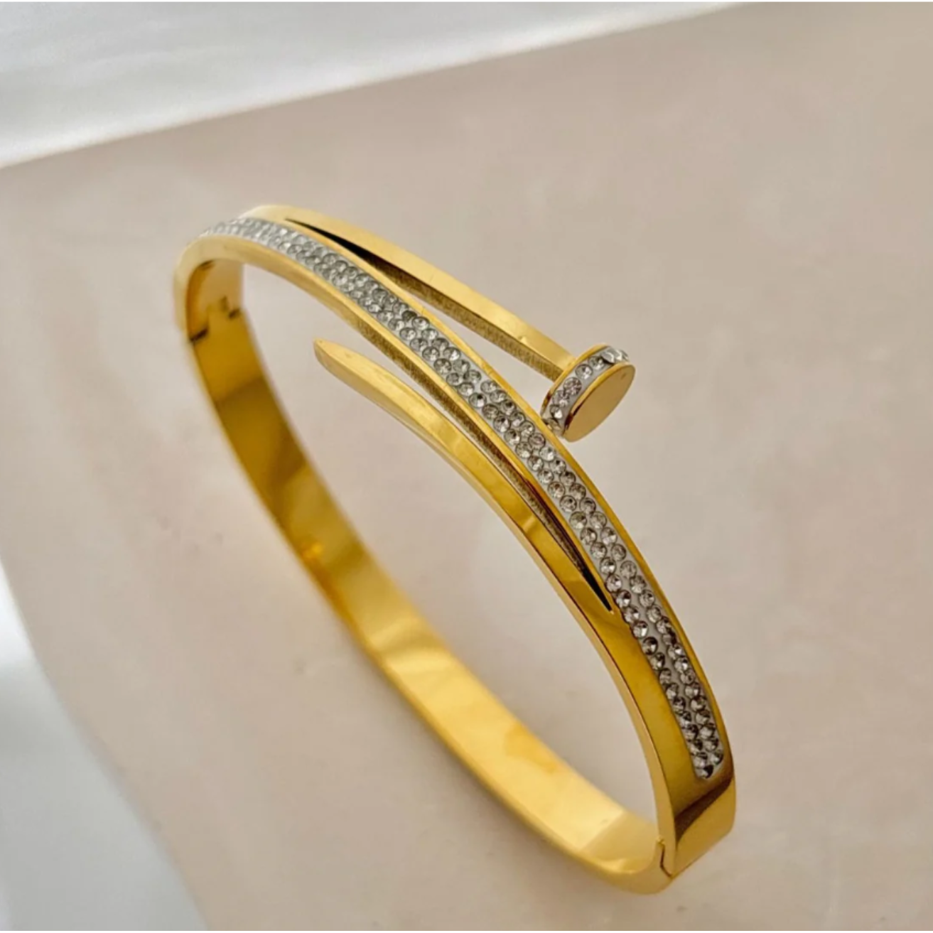 REGAL™ STONE GOLD NAIL BRACELET.